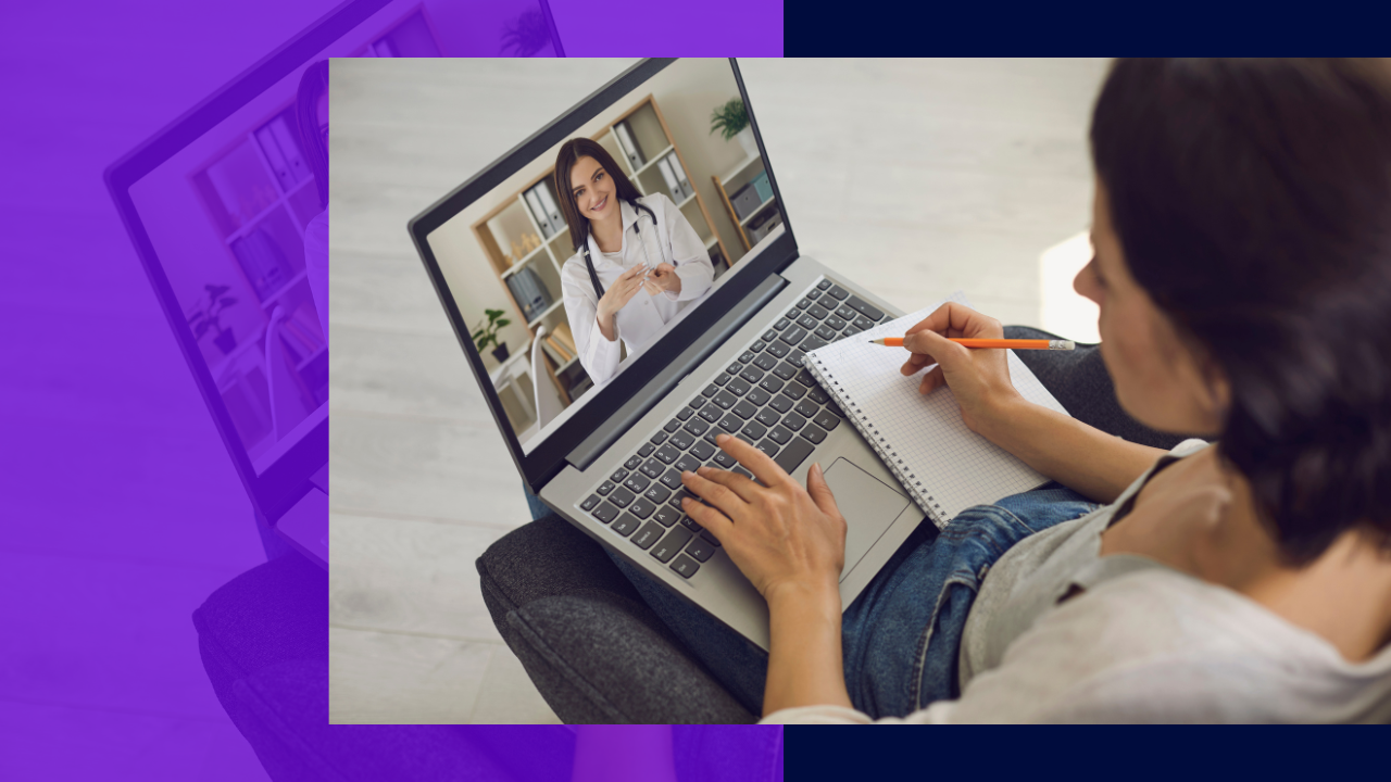 The woman is sitting in a chair using a laptop for a video call with a doctor while taking notes on a piece of paper.